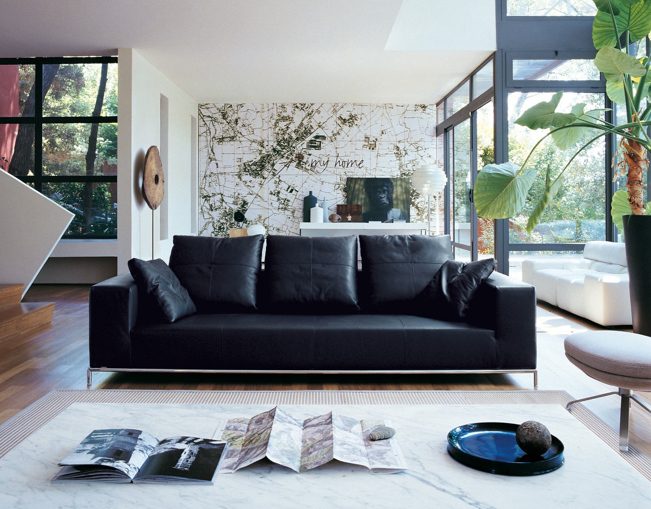 deluxe-design-black-leather-sofa-white-living-room