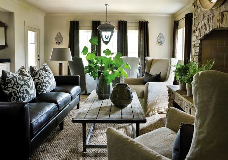 fresh-living-room-with-black-leather-sofa